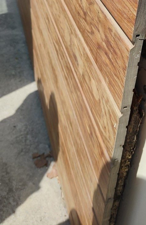 Bardage Pop'Oak installé en 2016 — finition Sikkens intacte après 8 ans en extérieur sans entretien